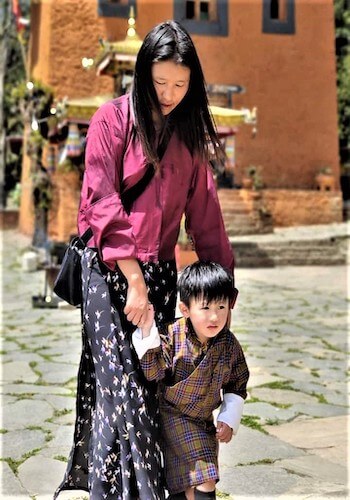 A Bhutanese woman and child wearing the national dress of Bhutan